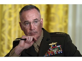 Gen. Joseph Dunford, the chairman of the Joint Chiefs of Staff, listens during the National Space Council meeting in the East Room of the White House in Washington, Monday, June 18, 2018. Hundreds of defence and security experts from around the world are expected to gather in Halifax this weekend to talk about everything from espionage and terrorism to Russian meddling and North Korea's threat to world order.