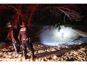 Migrants from Somalia cross into Canada illegally from the United States near Emerson, Man. in this Feb. 26, 2017 file photo. As Canada continues to grapple with an influx of irregular asylum seekers, statistics show a growing number of individuals seeking refugee protection in Canada are American.