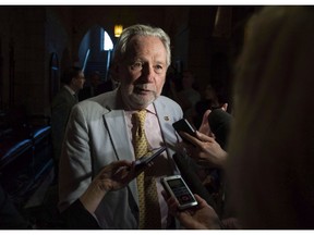 Sen. Peter Harder speaks on Parliament Hill in Ottawa on Tuesday, June 19, 2018. A Conservative senator is pushing back against criticism that a proposal for keeping tabs on senators' expense claims amounts to asking them to mark their own homework. Sen. David Wells says he was surprised to hear the government's representative in the Senate, Harder, reject the proposal to create a permanent audit and oversight committee, made up of five senators.