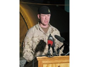 Lt.-Col. Craig Dalton, chief of staff for Task Force Kandahar, tells reporters that Canada has given command of Kandahar city to the U.S., Thursday, July 15, 2010 in Kandahar. The Trudeau government is tapping a former army officer, who previously served in Afghanistan and commanded Canadian Forces Base Gagetown in New Brunswick, as Canada's new veterans' ombudsman.THE CANADIAN PRESS/Bill Graveland