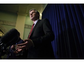 B.C. Liberal Leader Andrew Wilkinson answers questions from the media following the speech from the throne in the legislative assembly in Victoria, B.C., on Tuesday, February 13, 2018. British Columbia's Liberal leader Wilkinson says he gives himself and his party an "A for effort" in their work trying to reconnect with the electorate following a devastating loss of power last year.