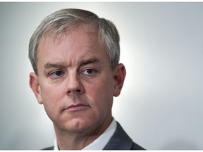 Dennis Oland attends a news briefing by his legal team in Saint John, N.B., on Tuesday, Nov. 20, 2018. A mistrial has been declared in the retrial of Oland for the second degree murder of his father. The 16-member jury has been dismissed, and the trial will continue Wednesday by judge alone. The verdict from Oland‚Äôs 2015 murder trial was set aside on appeal in 2016. Richard Oland, 69, was found dead in his Saint John office on July 7, 2011.