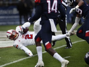 SMU running back Ke'Mon Freeman (2) crosses the goal line for a  touchdown in the first half of an NCAA college football game against Connecticut, Saturday, Nov. 10, 2018, in East Hartford, Conn.
