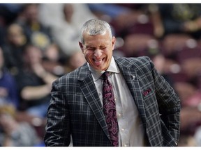 South Carolina head coach Frank Martin makes a face at a jump-ball call in the first half of an NCAA college basketball game against Providence, Saturday, Nov. 17, 2018, in Uncasville, Conn.