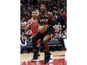 Phoenix Suns center Deandre Ayton (22) looks to the basket against the Chicago Bulls during the first half of an NBA basketball game Wednesday, Nov. 21, 2018, in Chicago.