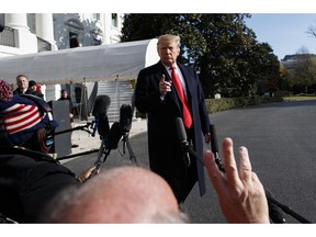 President Donald Trump talks with reporters before traveling to the G20 Summit in Buenos Aires, on the South Lawn of the White House, Thursday, Nov. 29, 2018, in Washington.