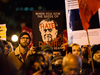 Protesters outside a Toronto Munk debate featuring Steve Bannon and conservative commentator David Frum in Toronto on Friday, Nov. 2, 2018.