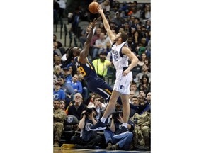 Utah Jazz forward Jae Crowder (99) has a shot blocked by Dallas Mavericks forward Maximilian Kleber (42) during the first half of an NBA basketball game in Dallas, Wednesday, Nov. 14, 2018.