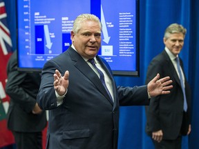 Ontario Premier Doug Ford gestures at the conclusion of a press conference in Toronto on Nov. 20, 2018.