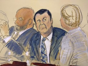 In this courtroom sketch Joaquin 'El Chapo' Guzman, centre, sits next to his defence attorney Eduardo Balazero, left, for opening statements as Guzman's high-security trial gets underway in the Brooklyn borough of New York, Tuesday, Nov. 13, 2018.
