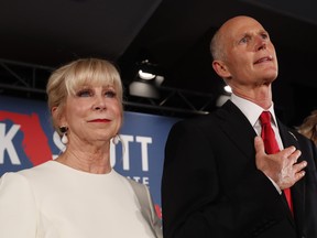 Republican Senate candidate Rick Scott with his wife Ann by his side at an election watch party in Naples, Florida.