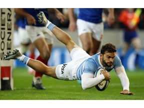 Argentina's Ramiro Moyano dives to score a try during the rugby union international match between France and Argentina at the Pierre Mauroy stadium, in Lille, northern France, Saturday, Nov. 17, 2018.