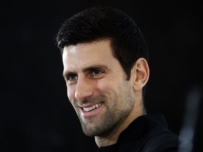 Tennis player Novak Djokovic of Serbia speaks during a press conference before the official launch of the ATP Tennis finals in London, Friday, Nov. 9, 2018.