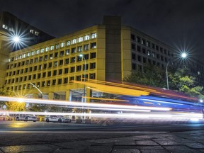 In this Nov. 1, 2017, file photo, traffic along Pennsylvania Avenue in Washington streaks past the Federal Bureau of Investigation headquarters building. The FBI says hate crimes reports were up about 17 per cent in 2017, marking a rise for the third year in a row.