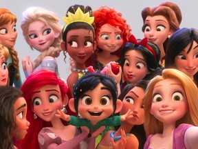 Vanellope von Schweetz, voiced by Sarah Silverman, foreground center, posing for a selfie with the Disney princesses .