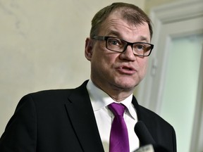 Finnish Prime Minister Juha Sipila talks to the media during a press conference in Helsinki, Finland, on  Monday March 26, 2018.