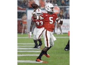 Miami quarterback N'Kosi Perry (5) throws a pass during the first half of an NCAA college football game against Duke, Saturday, Nov. 3, 2018, in Miami Gardens, Fla.