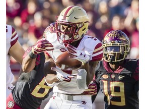 Boston College wide receiver Kobay White makes a catch against Florida State Stanford Samuels lll in the first half of an NCAA college football game in Tallahassee, Fla., Saturday, Nov. 17, 2018.