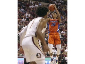 Florida's Noah Locke shoots during the first half of the team's NCAA college basketball against with Florida State, Tuesday, Nov. 6, 2018, in Tallahassee, Fla.