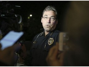 Tallahassee police chief Michael DeLeo speaks to the press at the scene of a shooting, Friday, Nov. 2, 2018, in Tallahassee, Fla. A shooter killed one person and critically wounded four others at a yoga studio in Florida's capital before killing himself Friday, officials said.