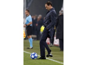 Juventus coach Massimiliano Allegri kicks the ball into the pitch during the Champions League group H soccer match between Juventus and Manchester United at the Allianz stadium in Turin, Italy, Wednesday, Nov. 7, 2018.