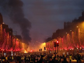 French police fired tear gas and water cannons to disperse demonstrators in Paris.