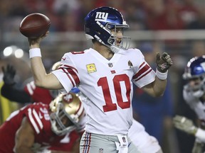 New York Giants quarterback Eli Manning (10) passes against the San Francisco 49ers during the first half of an NFL football game in Santa Clara, Calif., Monday, Nov. 12, 2018.