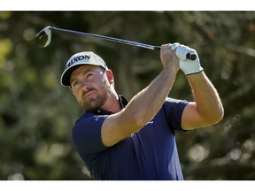 Graeme McDowell, of Northern Ireland, watches his drive off the second tee during the third round of the RSM Classic golf tournament on Saturday, Nov. 17, 2018, in St. Simons Island, Ga.