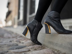 High heel boots in city