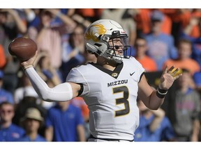 Missouri quarterback Drew Lock (3) throws a pass during the first half of an NCAA college football game against Florida Saturday, Nov. 3, 2018, in Gainesville, Fla.