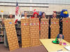 Middleton School District staff dressed for Halloween as a border wall with âMake America Great Againâ written on it.