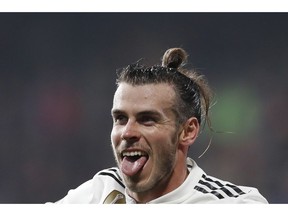Real midfielder Gareth Bale celebrates after scoring his side's fourth goal during the Champions League group G soccer match between Real Madrid and Viktoria Plzen at the Doosan arena in Pilsen, Czech Republic, Wednesday, Nov. 7, 2018.