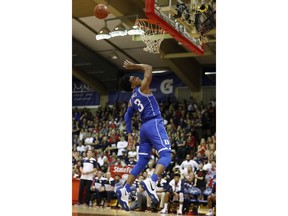 Duke guard Tre Jones (3) misses a slam dunk during the first half of an NCAA college basketball game against Gonzaga at the Maui Invitational, Wednesday, Nov. 21, 2018, in Lahaina, Hawaii.
