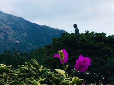 The Big Buddha sits serenely on the Ngong Ping Plateau surrounded by the mountains of Lantau Island.