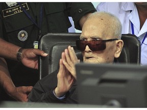 In this photo released by the Extraordinary Chambers in the Courts of Cambodia, Nuon Chea, who was the Khmer Rouge's chief ideologist and No. 2 leader, sits in a court room before a hearing at the U.N.-backed war crimes tribunal in Phnom Penh, Cambodia, Friday, Nov. 16, 2018. The last surviving leaders of the Khmer Rouge that brutally ruled Cambodia in the 1970s were convicted of genocide, crimes against humanity and war crimes Friday by an international tribunal.