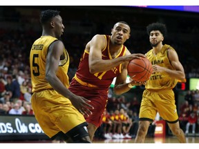 Iowa State guard Talen Horton-Tucker (11) drives to the basket past Alabama State guard Tobi Ewuosho, left, during the first half of an NCAA college basketball game, Tuesday, Nov. 6, 2018, in Ames, Iowa.