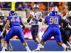 BYU quarterback Zach Wilson (11) looks for a receiver during the first half of an NCAA college football game against Boise State on Saturday, Nov. 3, 2018, in Boise, Idaho.