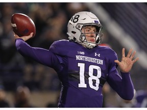 Northwestern's Clayton Thorson makes a pass against Notre Dame during the first half of an NCAA college football game Saturday, Nov. 3, 2018, in Evanston, Ill.
