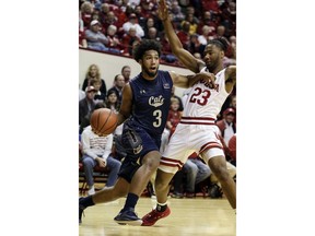 Montana State guard Tyler Hall (3) cuts in front of Indiana forward Damezi Anderson (23) during the first half of an NCAA college basketball game in Bloomington, Ind., Friday, Nov. 9, 2018.