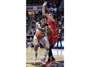 Purdue guard Carsen Edwards, left, moves toward the basket defended by Fairfield guard Neftali Alvarez during an NCAA college basketball game, Tuesday, Nov. 6, 2018, in West Lafayette, Ind.