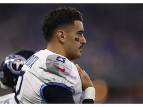 Tennessee Titans quarterback Marcus Mariota watches from the bench during the second half of an NFL football game against the Indianapolis Colts, Sunday, Nov. 18, 2018, in Indianapolis.