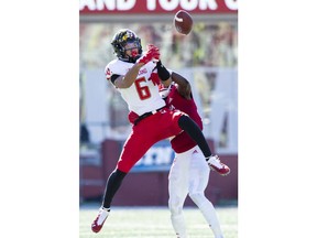 Maryland wide receiver Jeshaun Jones (6) watches the ball approach as he's defended by Indiana defensive back Jaylin Williams (23) who breaks up the play during the first half of an NCAA college football game Saturday, Nov. 10, 2018, in Bloomington, Ind.