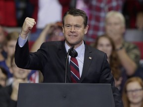 Sen. Todd Young, R-Ind., speaks at a campaign rally featuring President Donald Trump at the Allen County War Memorial Coliseum in Fort Wayne, Ind., Monday, Nov. 5, 2018.