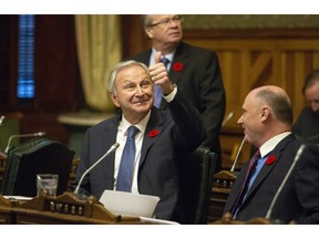 New Brunswick Progressive Conservative Leader Blaine Higgs signals to the gallery prior to the closure of the Throne Speech at the New Brunswick Legislature in Fredericton on Friday, Nov. 2, 2018.