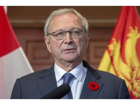 New Brunswick Progressive Conservative Leader Blaine Higgs answers questions from the media after meeting with Lieutenant Governor of New Brunswick Jocelyne Roy-Vienneau at Government House in Fredericton on Friday, Nov. 2, 2018.