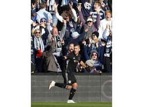 Sporting Kansas City forward Diego Rubio celebrates after scoring against Real Salt Lake during the first half of an MLS Western Conference semifinal soccer match in Kansas City, Kan., Sunday, Nov. 11, 2018.