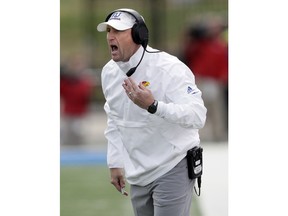 Kansas head coach David Beaty yells to his team during the second half of an NCAA college football game against Iowa State in Lawrence, Kan., Saturday, Nov. 3, 2018.
