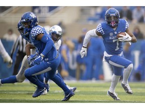 Kentucky safety Mike Edwards (7) runs with the ball during the first half of an NCAA college football game against Middle Tennessee in Lexington, Ky., Saturday, Nov. 17, 2018.