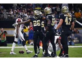New Orleans Saints cornerback P.J. Williams (26) celebrates a pass breakup in the second half of an NFL football game against the Atlanta Falcons in New Orleans, Thursday, Nov. 22, 2018. The Saints won 31-17.