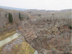 British Columbia's Ministry of Transportation says an evacuation order has been lifted and almost all residents can return home to the small community of Old Fort, which was threatened by a slow-moving landslide for several weeks. The landslide is seen inching down a hillside in northern British Columbia, prompting the evacuation of nearby Old Fort, B.C., in an undated handout photo.